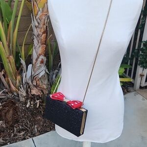 Kate Spade Disney Minnie Mouse bow clasp clutch
